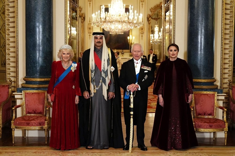 Beckham çifti Buckingham Sarayı'nda davete katıldı