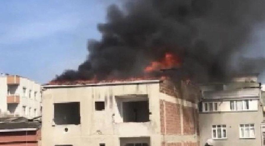 Binada çıkan yangın söndürüldükten sonra ceset ortaya çıktı