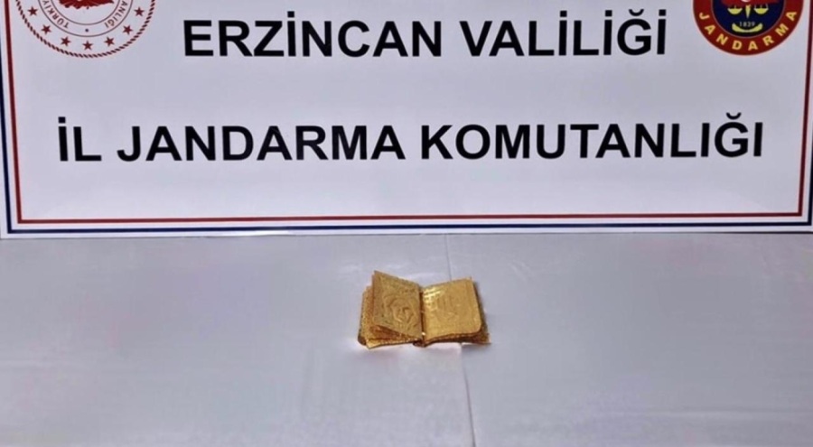 Erzincan'da  14 sayfa altın kitap ele geçirildi