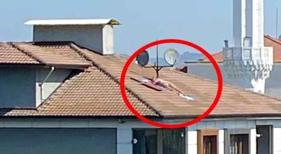 Düzce polisi, çatıda çıplak güneşlenen kişiyi arıyor!