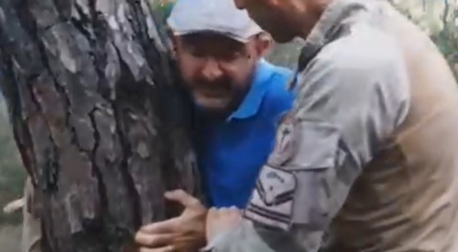 Akbelen Ormanı'nda köylüler kesilmesini engellemek için ağaçlara sarıldı