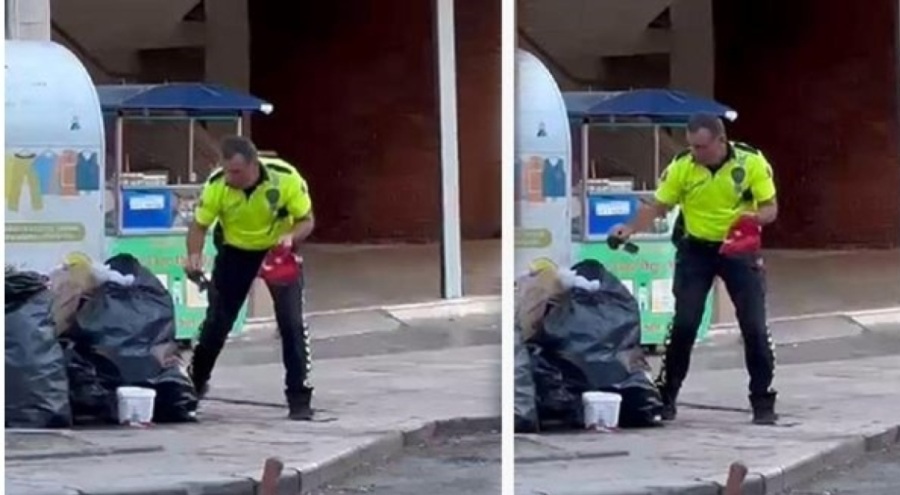 Trafik polisinden alkışlanacak hareket: Çöpe atılan Türk bayrağını aldı