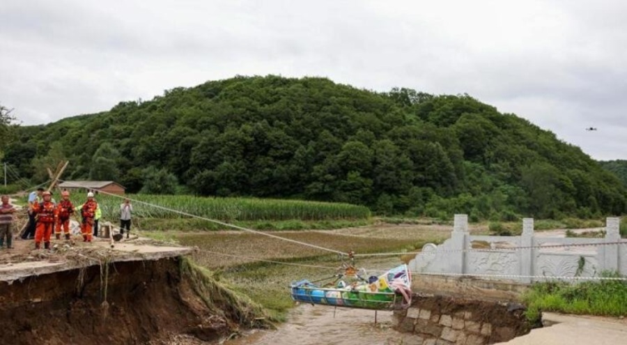 Çin'deki sel 14 kişiyi hayattan kopardı