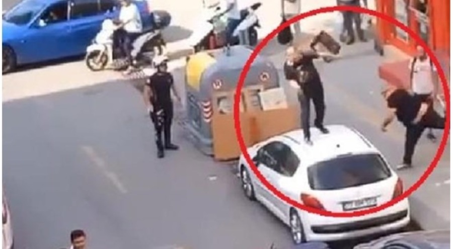 Araçların üzerine çıkıp etrafa biber gazı sıktı