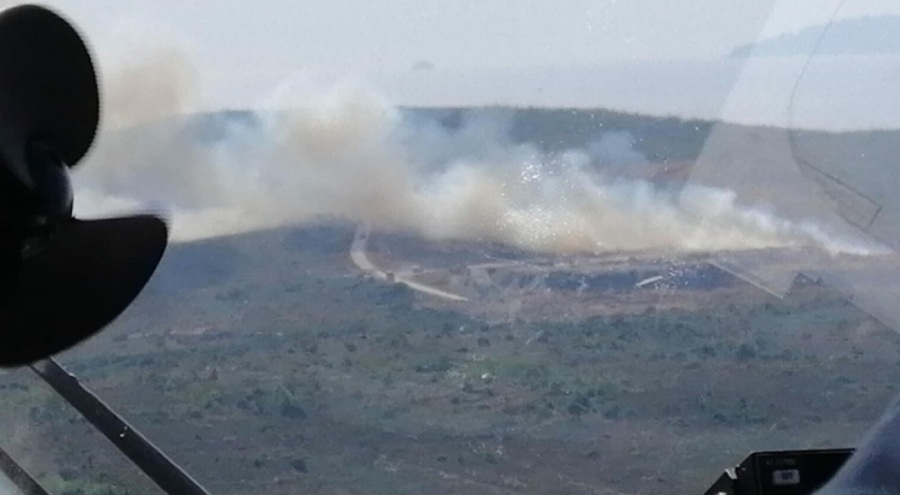 Çeşme'de çöplükte çıkan yangın ormana sıçradı