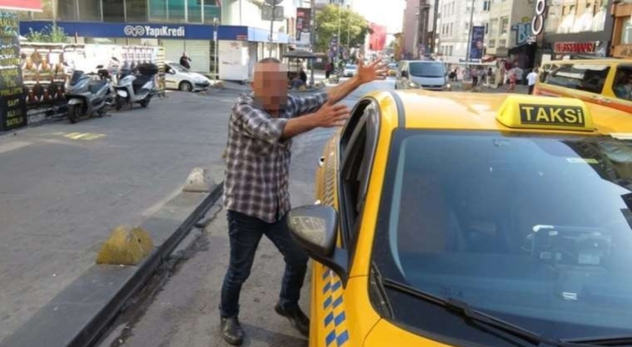 Ceza yiyen taksi şoföründen yumruk: Parçalayacağım