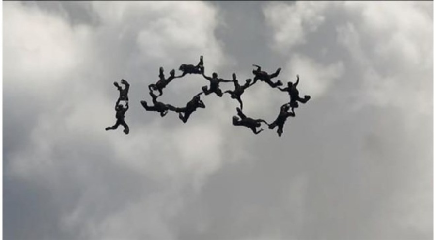 Bordo berelilerden, gökyüzünde 100 rakamı