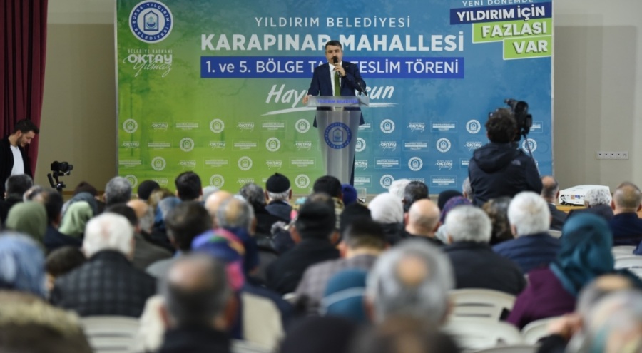 Bursa'da bin 503 hak sahibine imar parseli tapularını teslim etti