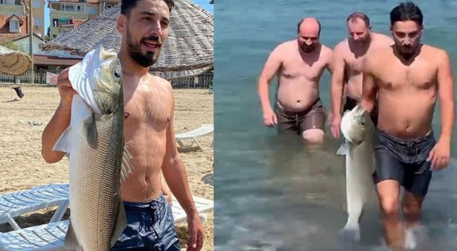 Yüzmek için girdiği denizde eliyle 6 kiloluk levrek yakaladı