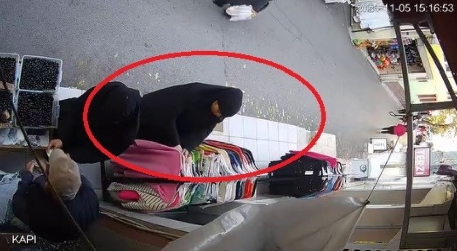 Bursa'da kadın hırsız kaşla göz arasında kıyafet çaldı!
