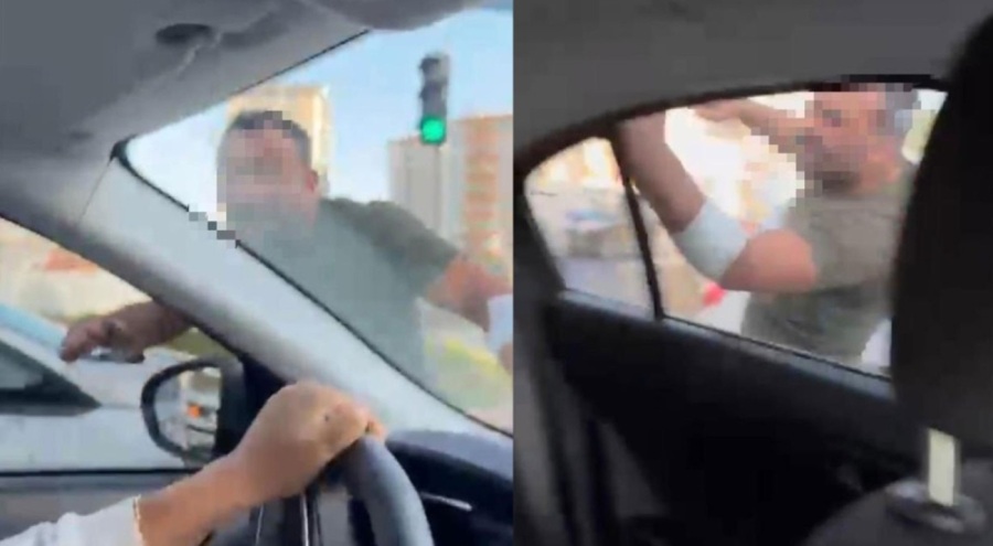 Trafikte tartıştığı kadınların otomobilini yumrukladı