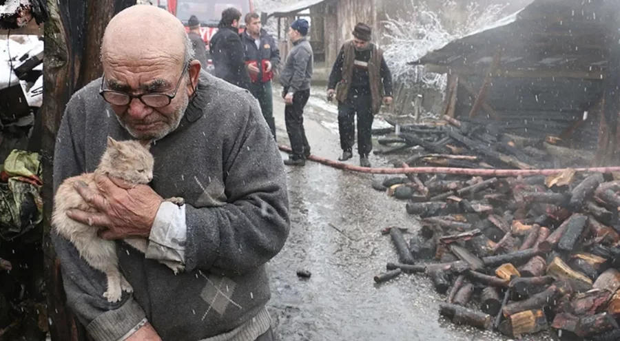 Yanan evinin önünde kedisine sarıldığı fotoğrafla tanınıyordu: Hayatını kaybetti