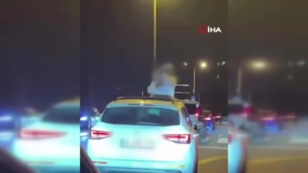 Başakşehir'de yolcu seyir halindeki otomobilden sarktı