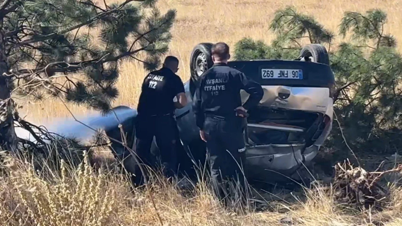 Takla atan otomobilden yara almadan kurtuldu